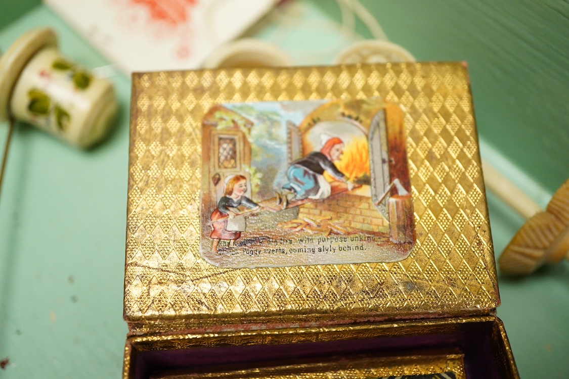A Victorian mother of pearl inlaid rosewood sewing box and contents including a silver thimble and carved bone thread reels, 33cm wide